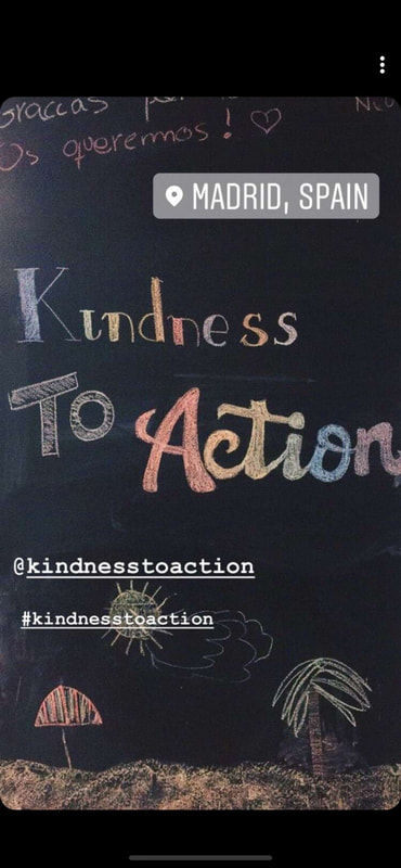 Kindness to action chalk in Madrid Spain
