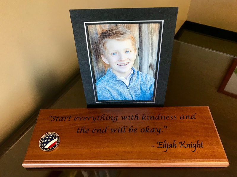 Kindness quote engraving in wood